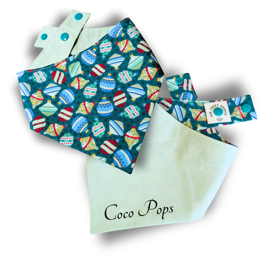 Reversible Christmas dog bandana featuring festive baubles pattern and fresh mint green reverse with personalised pet name - The Jazzy Pooch