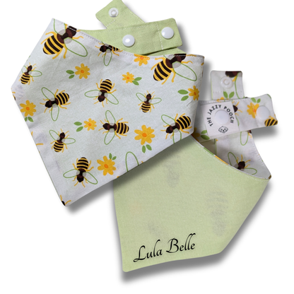 Reversible dog bandana displaying honeybees and flowers pattern with leafy green reverse and personalised pet name, handcrafted from sustainable reclaimed fabric - The Jazzy Pooch