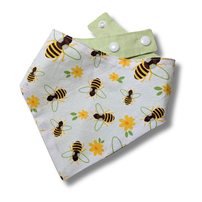 Reversible dog bandana featuring delightful garden flowers and buzzing honeybees on white background, planet-friendly cotton - The Jazzy Pooch
