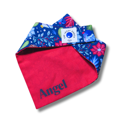 Raspberry red reverse of sustainable dog bandana with personalised pet name and The Jazzy Pooch branded label detail - The Jazzy Pooch